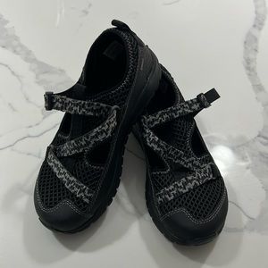 New / with tags / never worn. Black Chaco water shoes with grey straps.